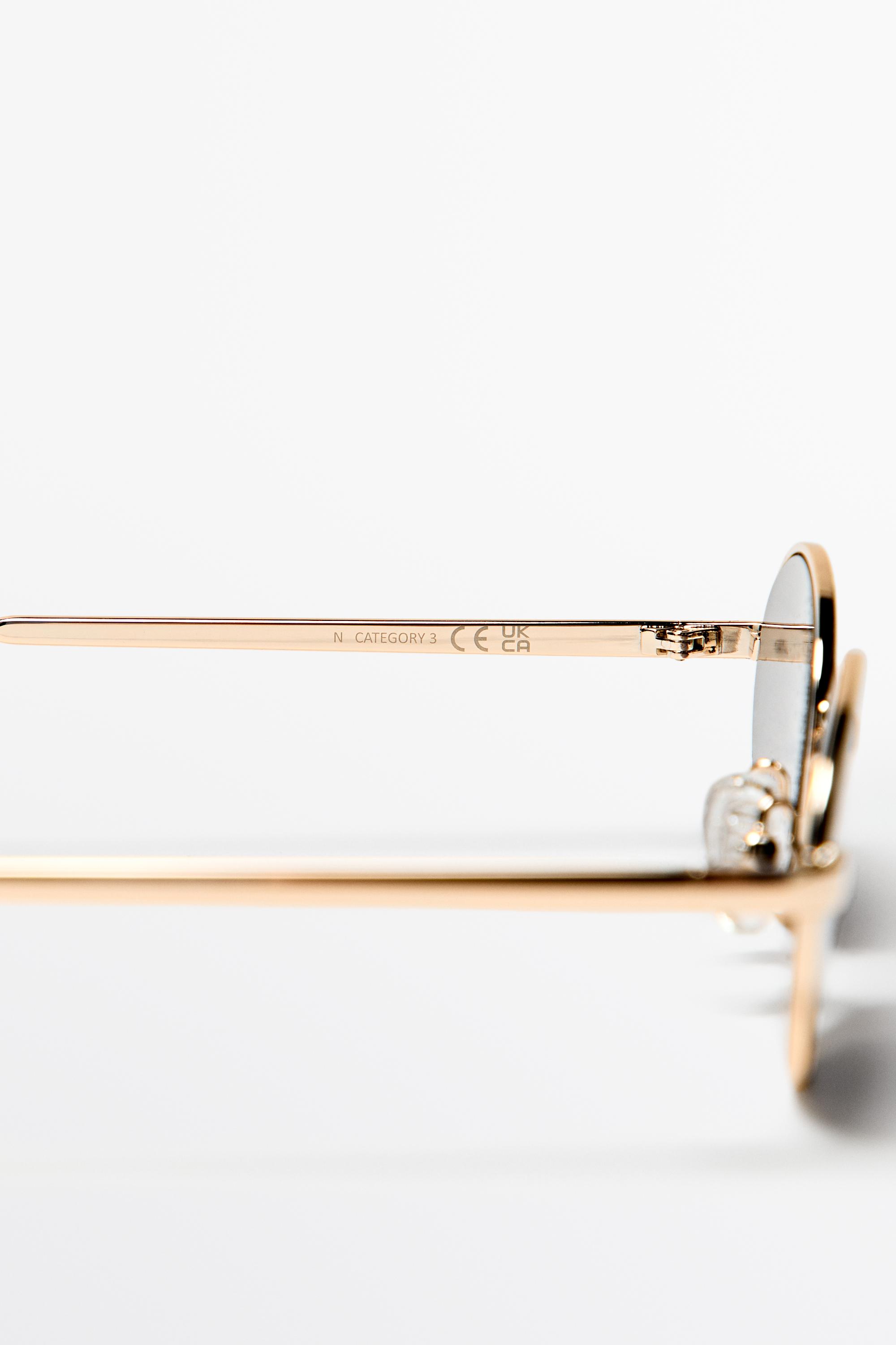 Metallic oval sunglasses